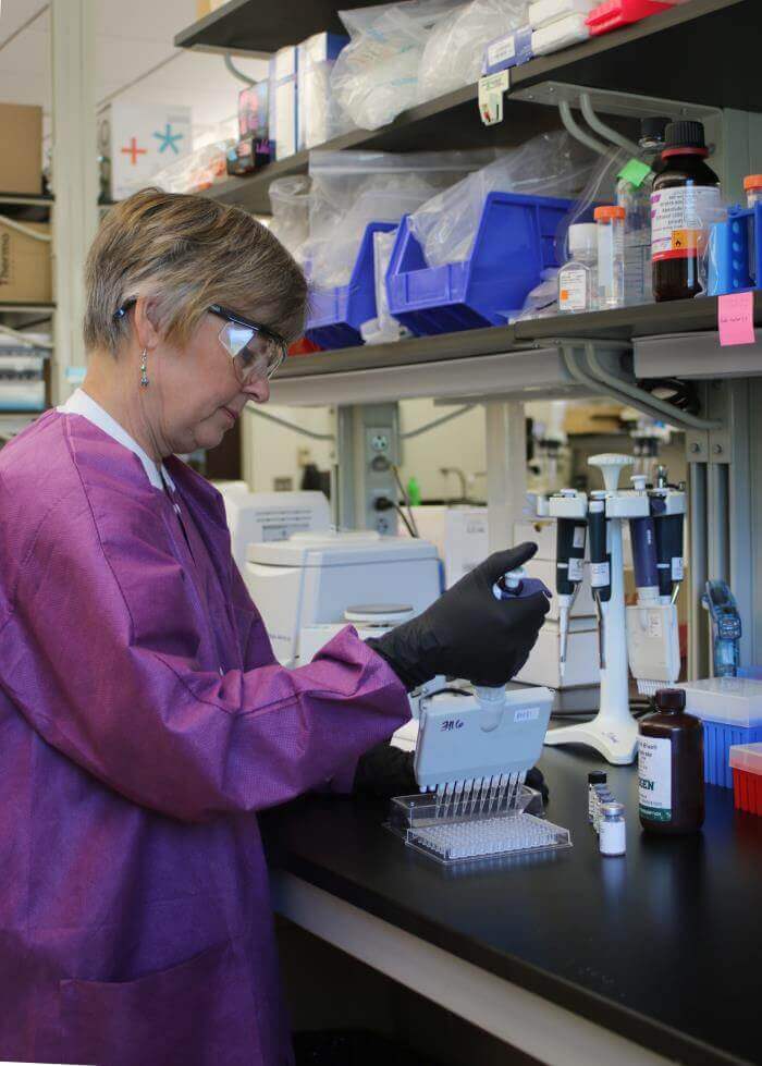 A CDC researcher prepares reagents that would be used in a CDC-developed Zika diagnostic test. Photo: CDC/Sue Partridge, CDC- Ft. Collins